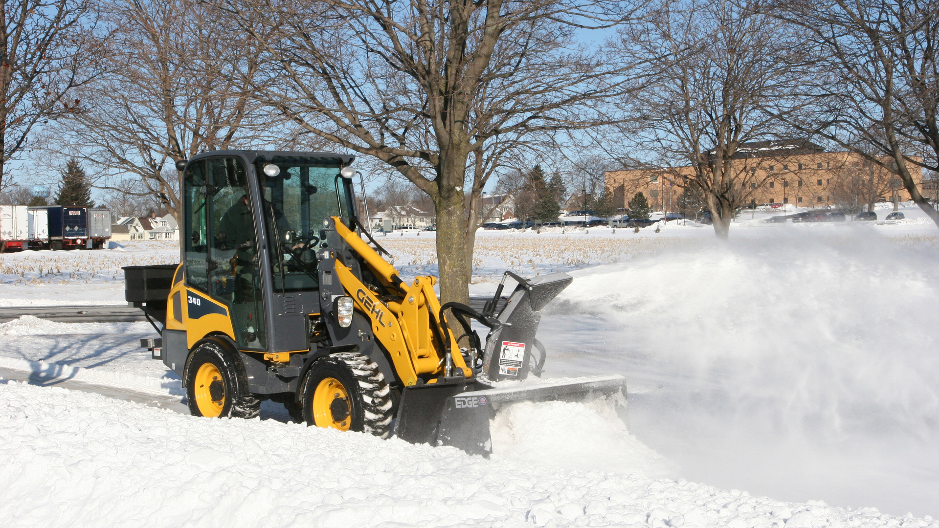 Gehl 340 blowing snow