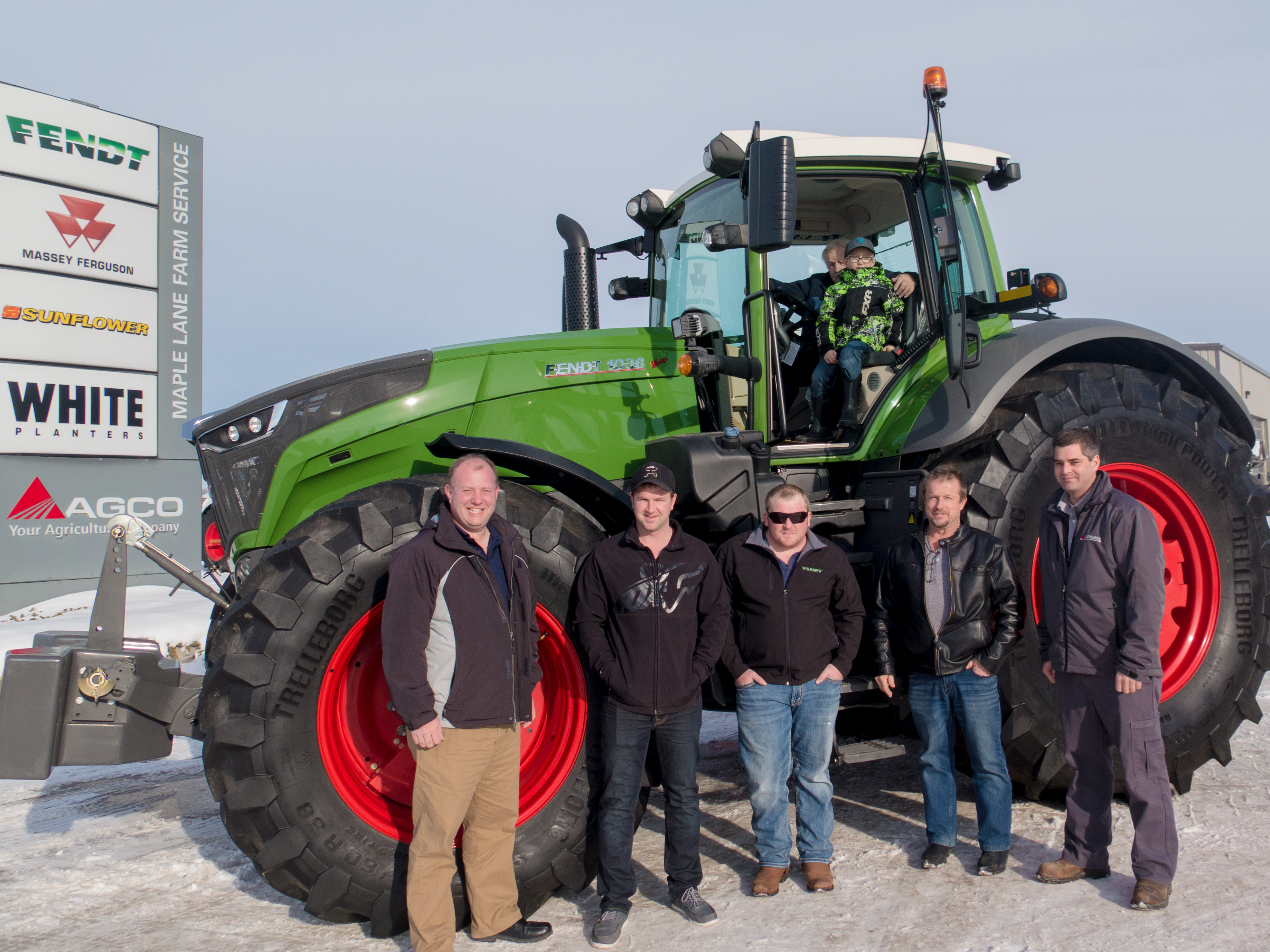 The Vollmer Family taking delivery of their Fendt 1038