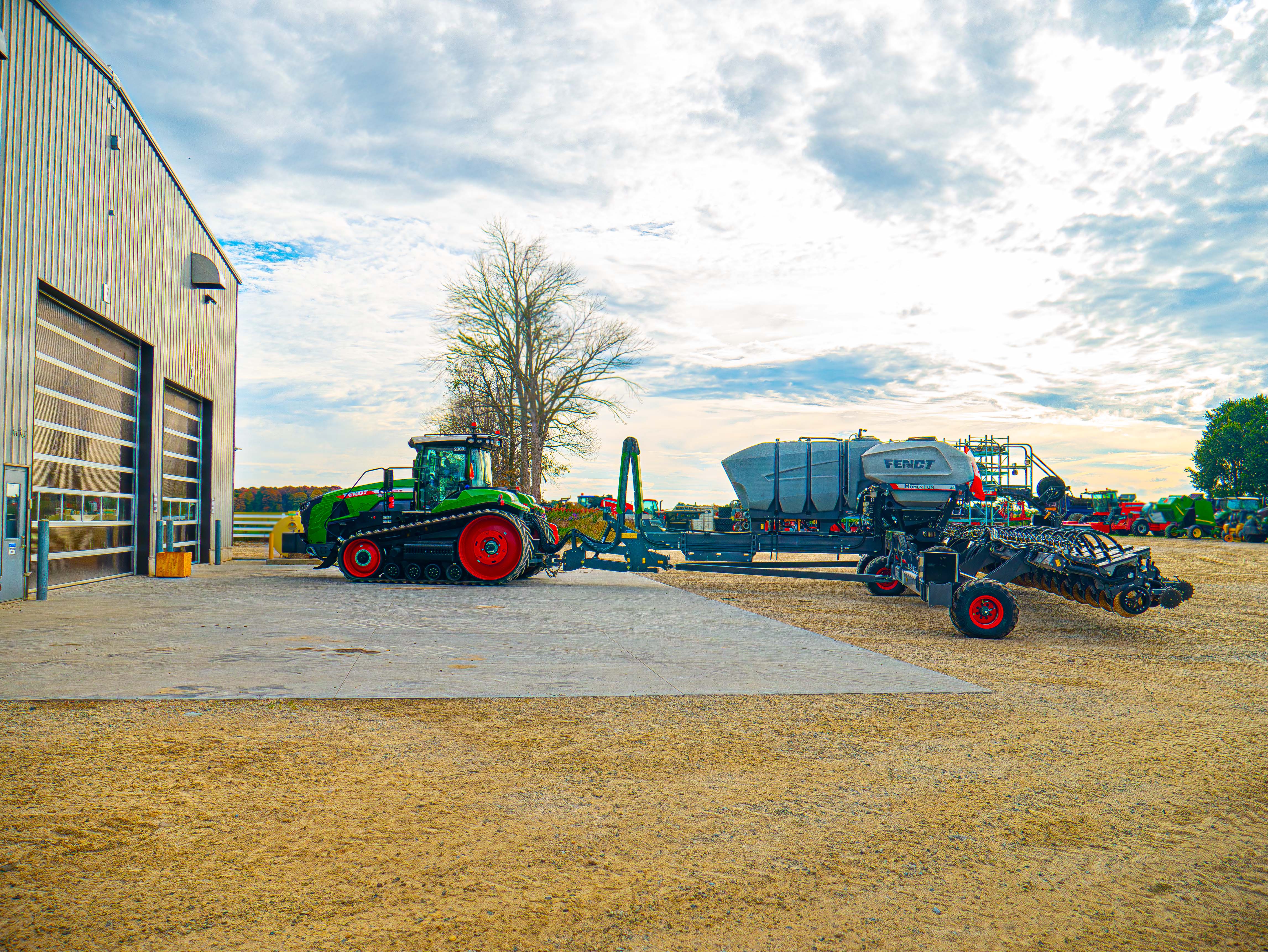 Fendt 1100 with Momentum Planter Sitting in front of Maple Lane's Mechanics Bay
