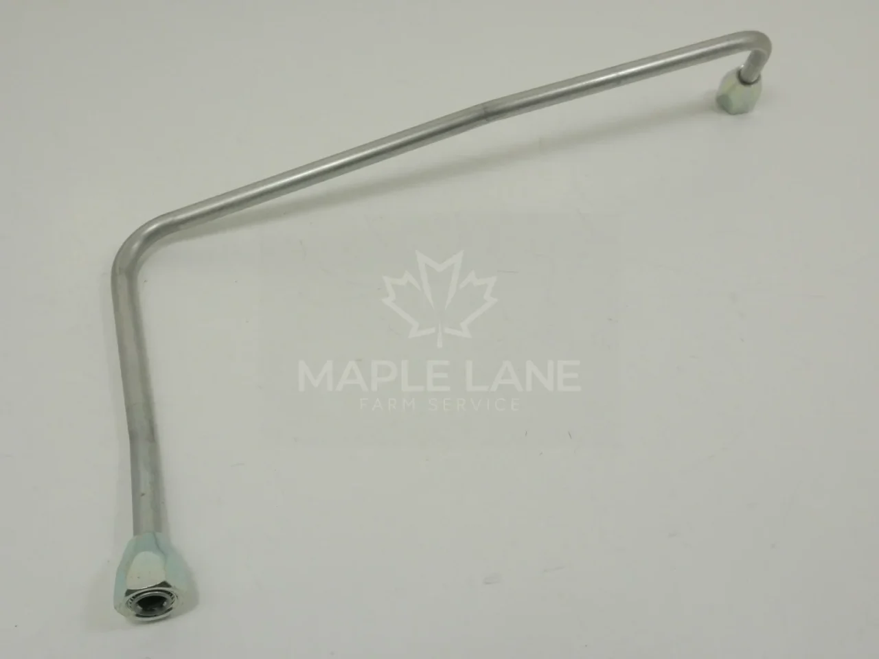 7067614M91 Oil Line