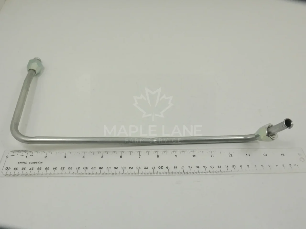 7067614M91 Oil Line