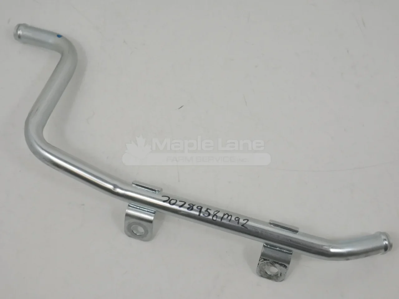 7078958M93 Oil Cooler Pipe